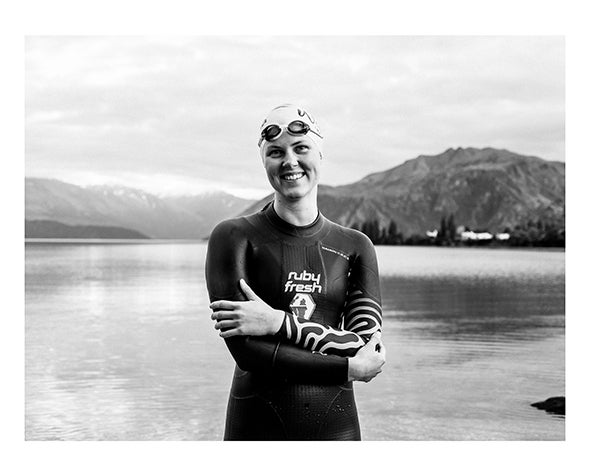 Livi Schmid poses for a photo in front of Lake Wanaka.