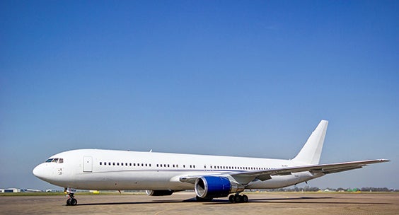 Airplane on the runway on a sunny day