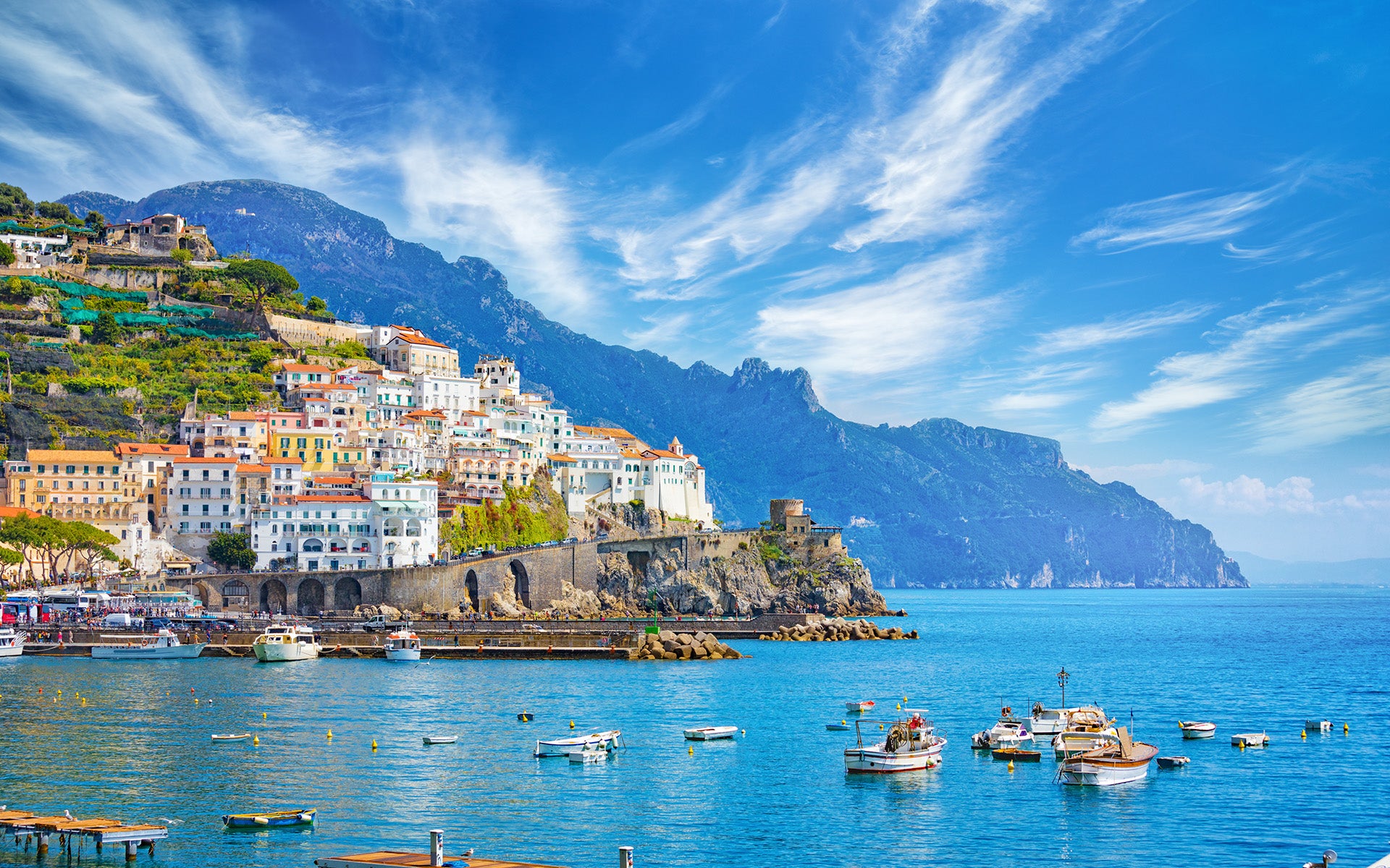 Blue ocean and city on the hill on the Amalfi Coast