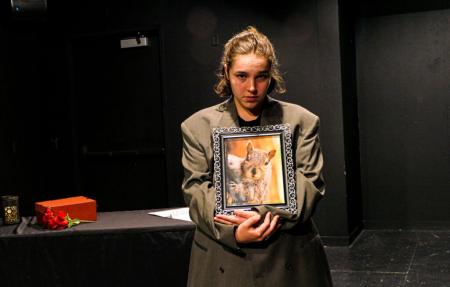 Izzy Chern plays the leading role in “In Loving Memory,” a play about a funeral for a squirrel.
