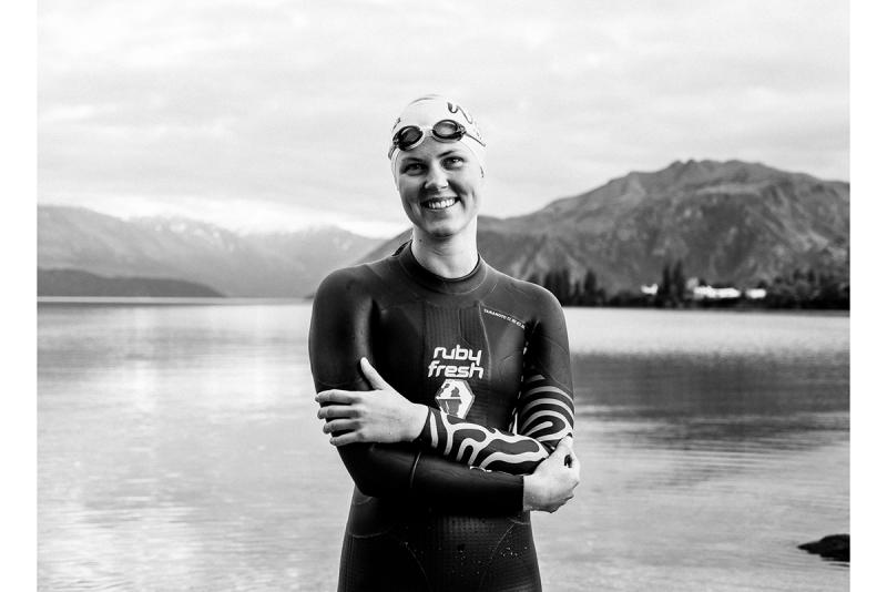 Livi Schmid poses for a photo in front of Lake Wanaka.