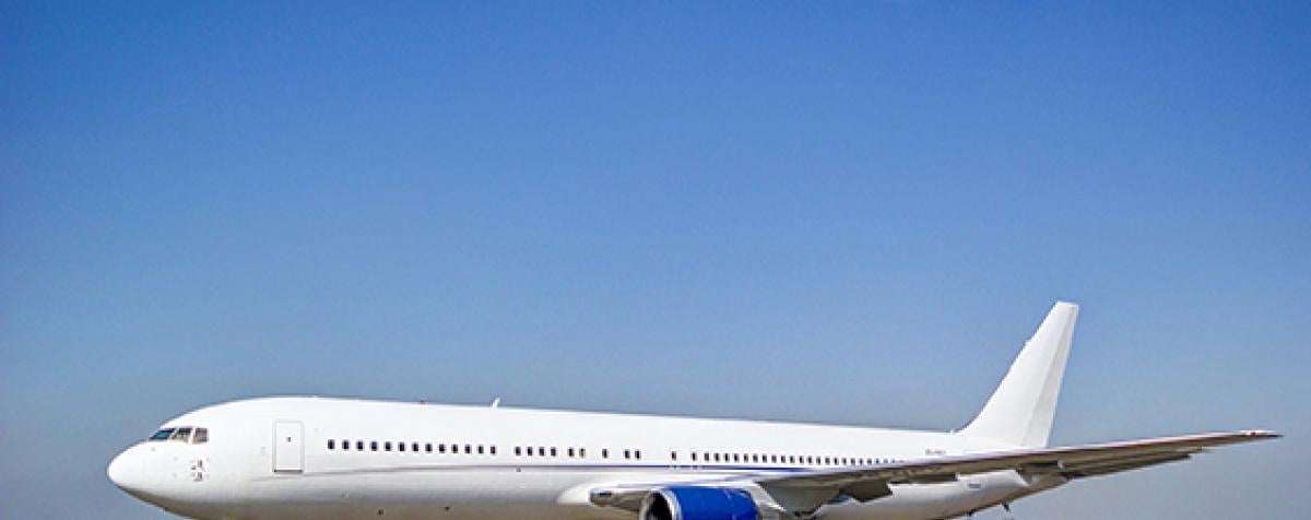 Plane parked on runway