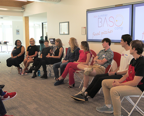 The 2024 BASE Camp cohort sits for a panel discussion at the Final Pitch