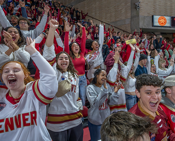 Students cheering in Magess Arena